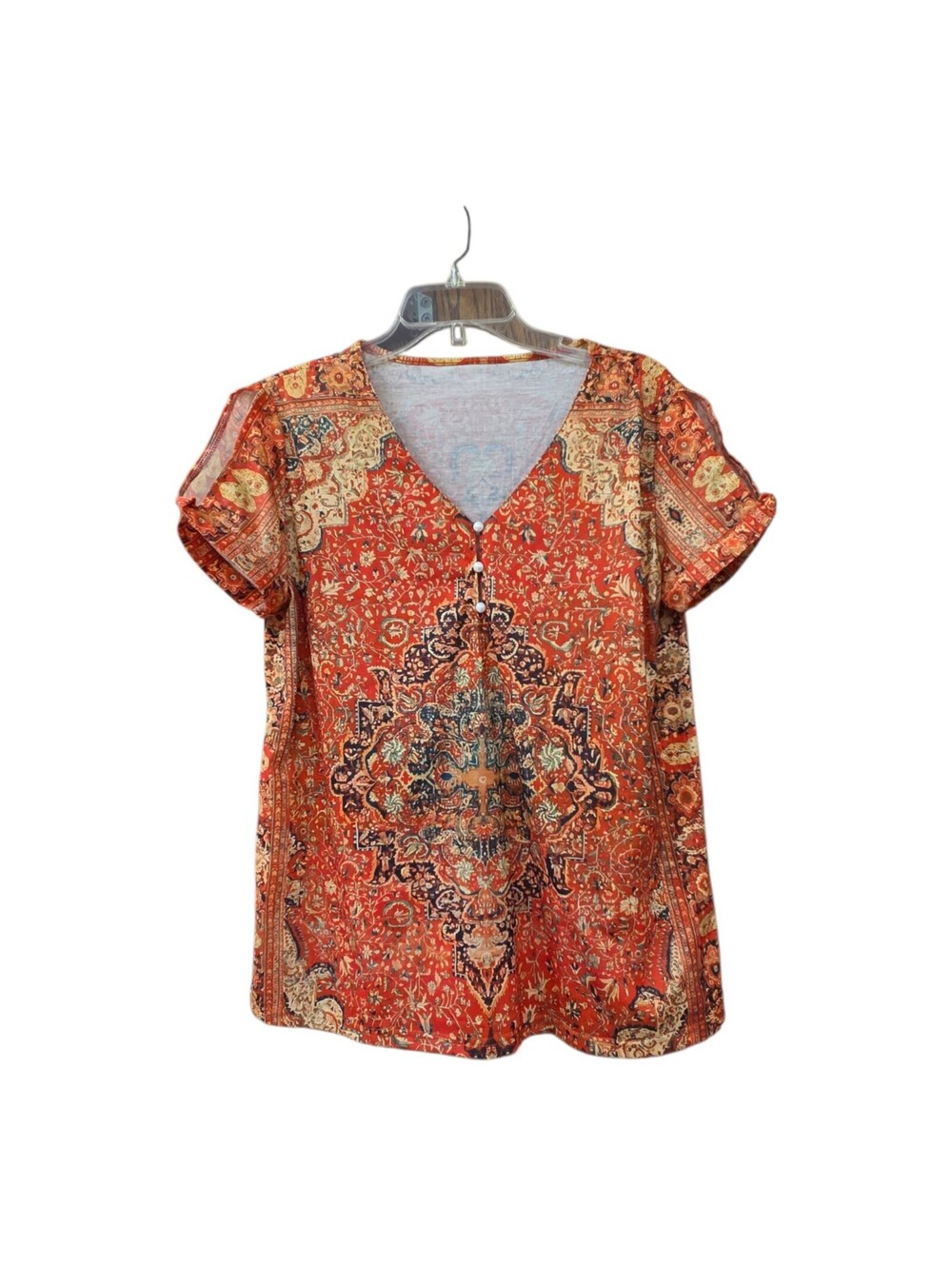 Orange shortsleeve blouse with white buttons